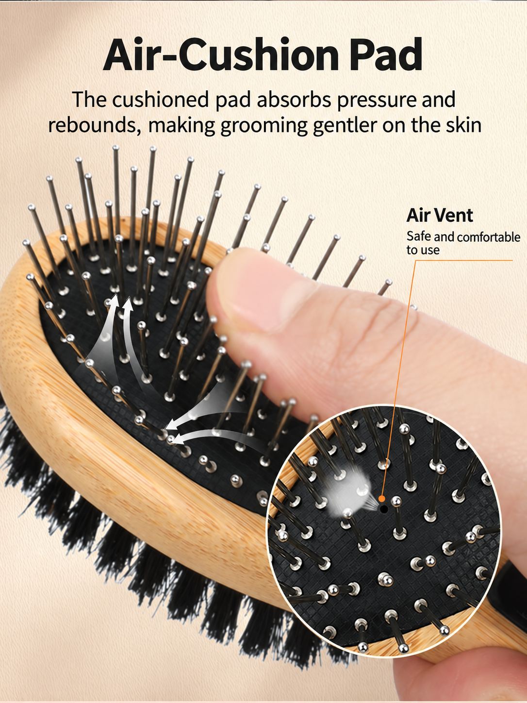 Cushioned metal pin pad and air vent close-up on pet brush