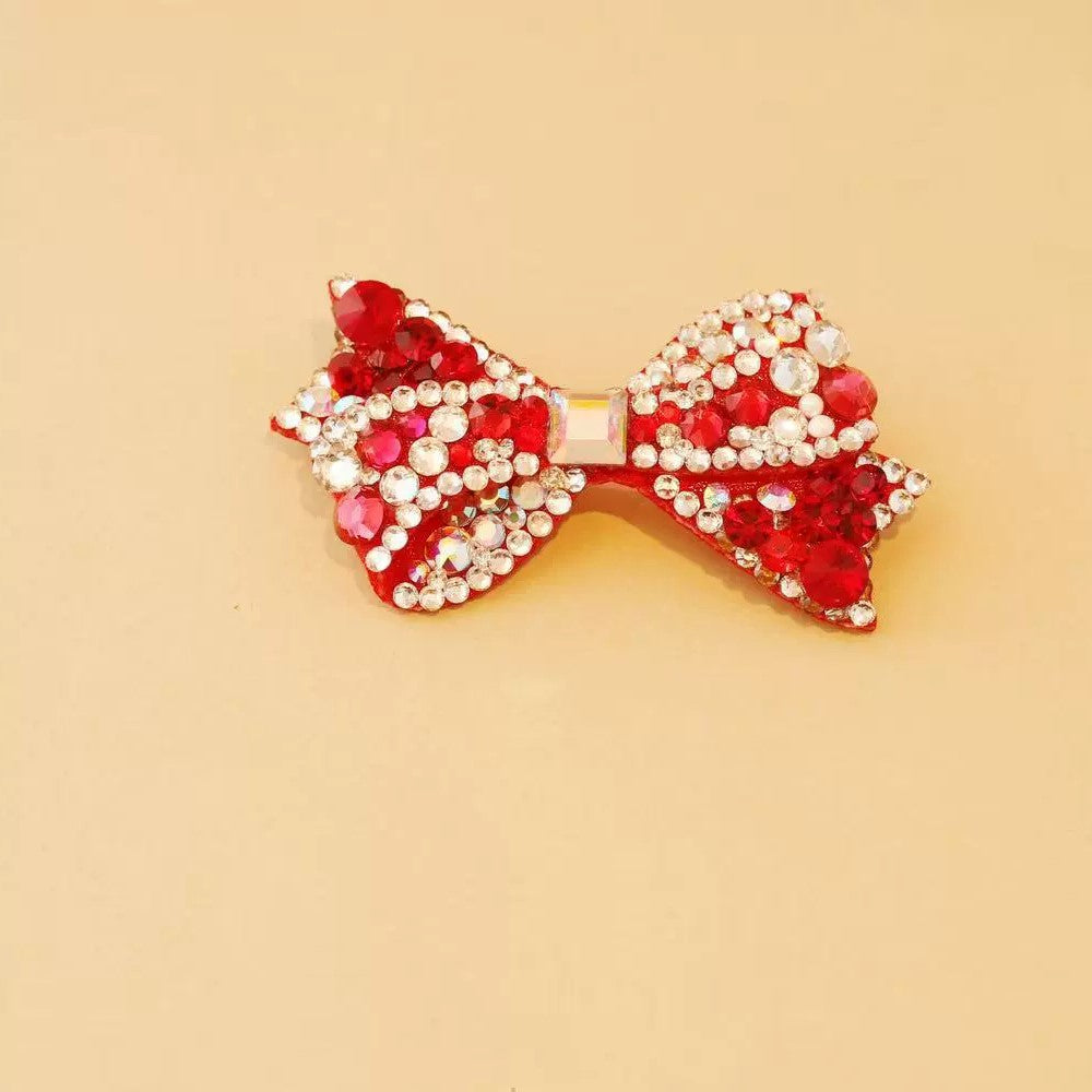Red rhinestone bow pet hair accessory with clear crystals and square center accent