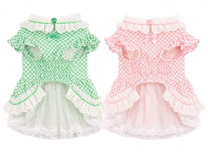 Back view of pink and green gingham dog dresses featuring lace trim, smocked waist, and layered tulle skirt
