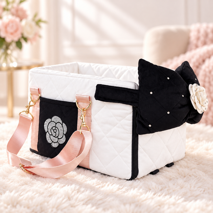 White quilted pet car seat backpack carrier with black bow and pink straps