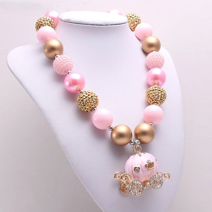 Pink pumpkin carriage pet necklace displayed on a white jewelry bust