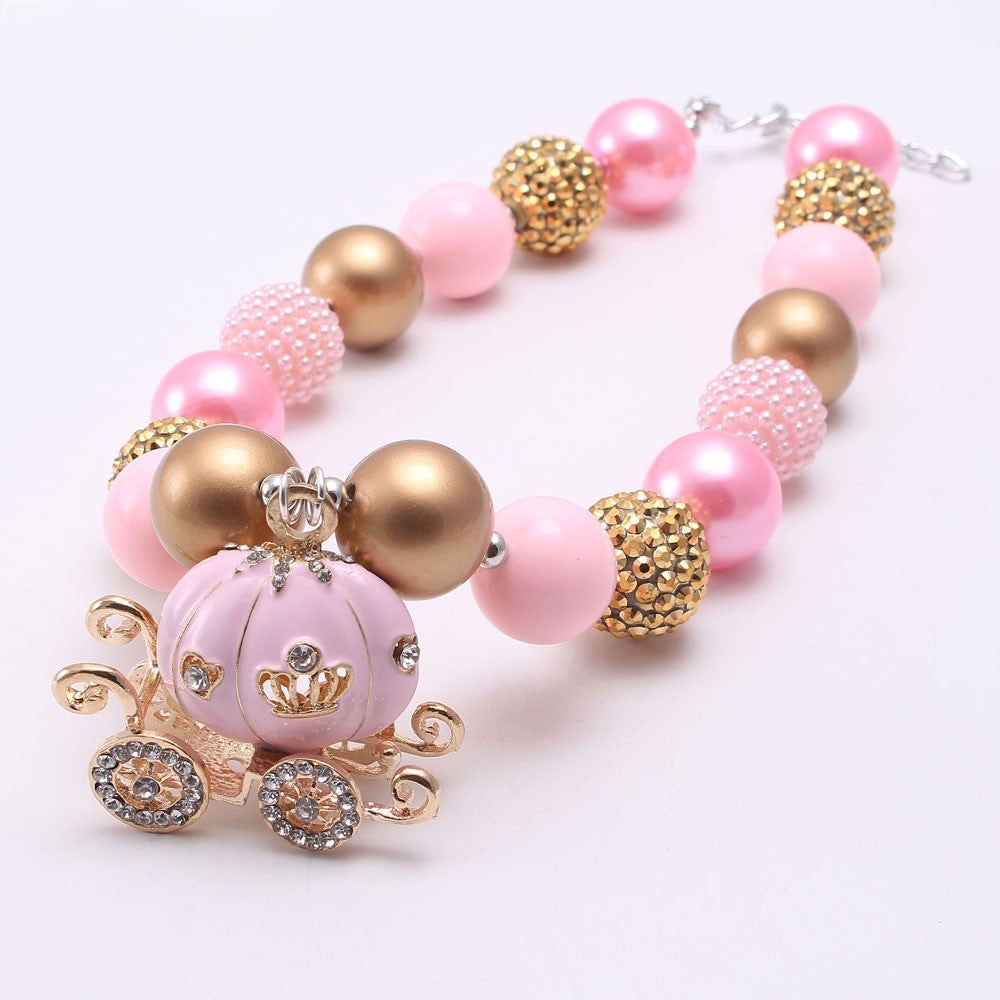 Pink and gold beaded dog necklace with pumpkin carriage pendant and extender chain