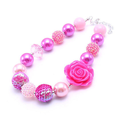 Pink acrylic beaded dog necklace with large rose centerpiece and mixed bead finishes
