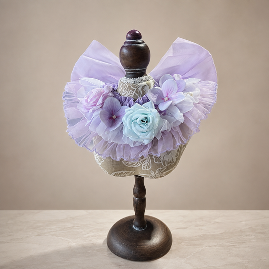 Front view of lavender blue satin lace pet bib collar with floral accents and ruffled trim