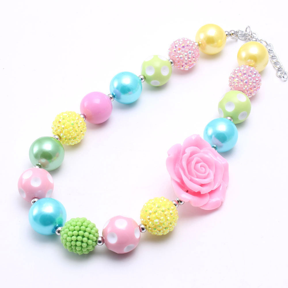 Full view of pastel rose beaded dog necklace with polka dot and sparkle beads