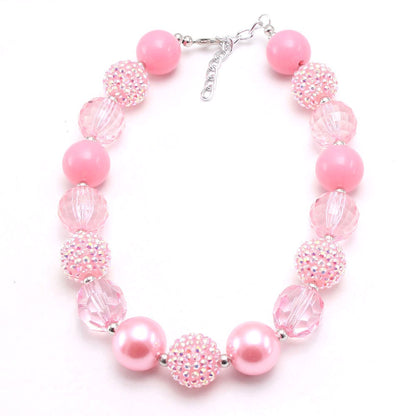 Front view of pink beaded dog necklace with silver-tone clasp and extender chain
