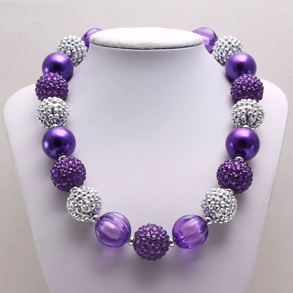 Purple and silver sparkle beaded pet necklace displayed on a white jewelry bust