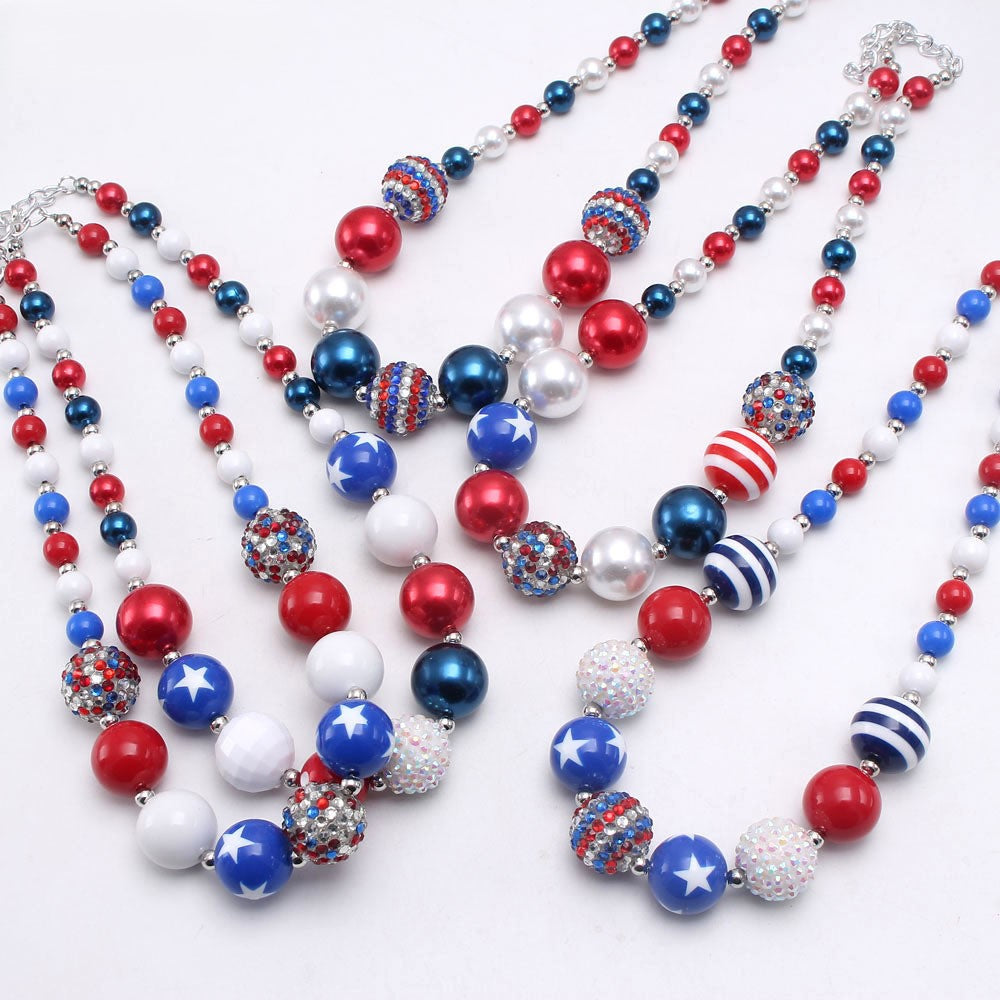 Assortment of three patriotic red white and blue beaded pet necklace designs