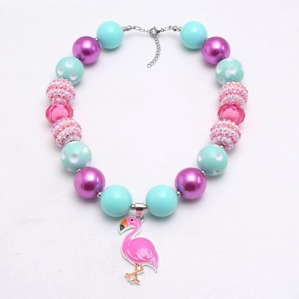 Front view of mint pink and purple beaded dog necklace with flamingo pendant