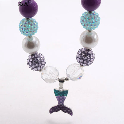 Close-up of purple aqua acrylic pet necklace with mermaid tail pendant