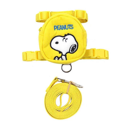 Yellow cartoon dog backpack harness set with matching leash on white background
