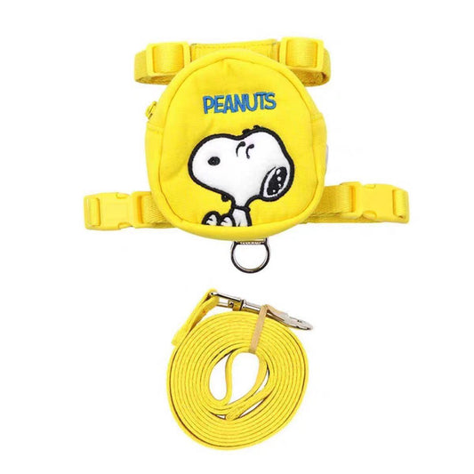 Yellow cartoon dog backpack harness set with matching leash on white background