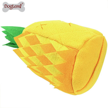 Golden Retriever enjoying plush pineapple treat dispensing nose work toy