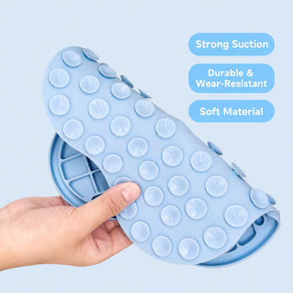 Blue pet silicone lick mat underside showing suction cups and flexible material