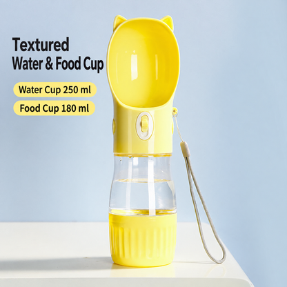 Yellow dog and cat travel water bottle with integrated trough and dry food container