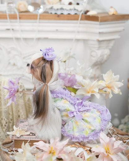 Side profile of lavender floral puppy dress featuring satin bow and elegant princess silhouette