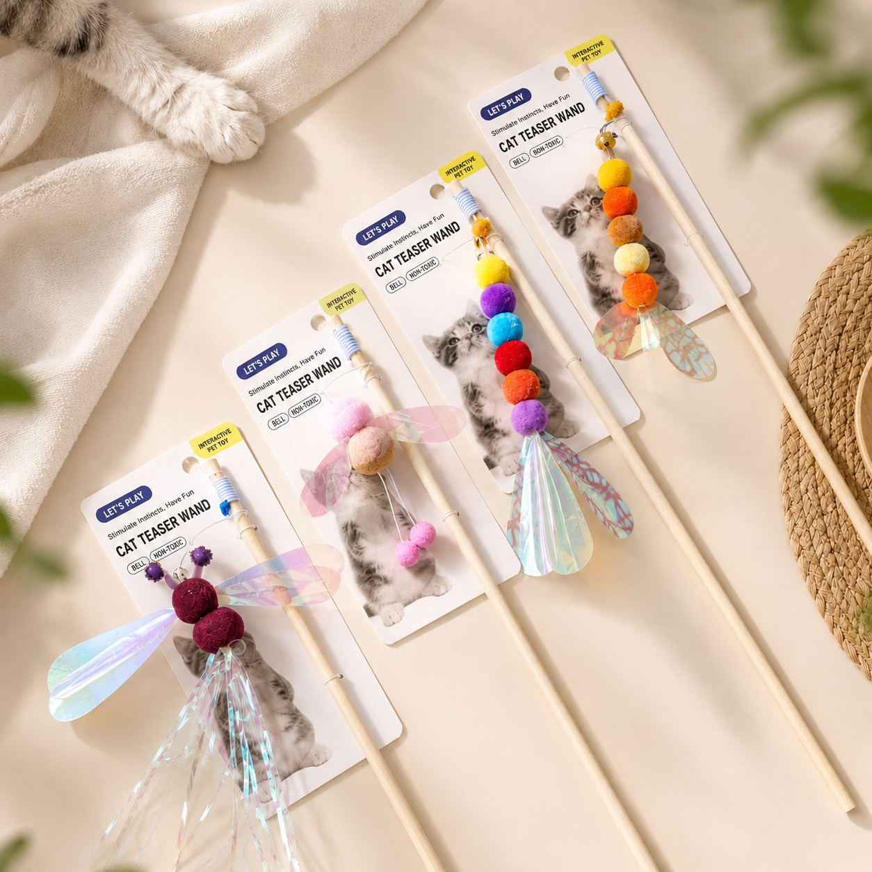 Dragonfly cat teaser wand with bell, colorful pom balls, iridescent wings, and wooden handle for interactive play