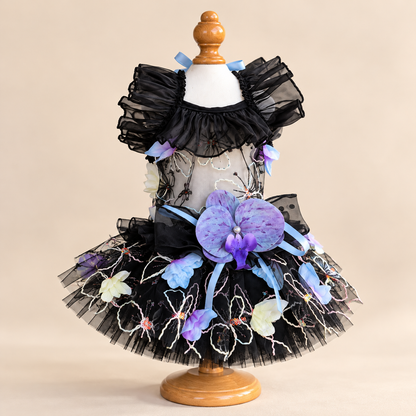 Front view of Black embroidered tulle pet dress with purple flower
