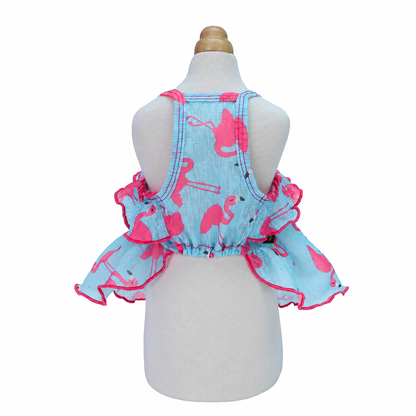 Back view of the blue flamingo ruffle dog dress with shoulder straps