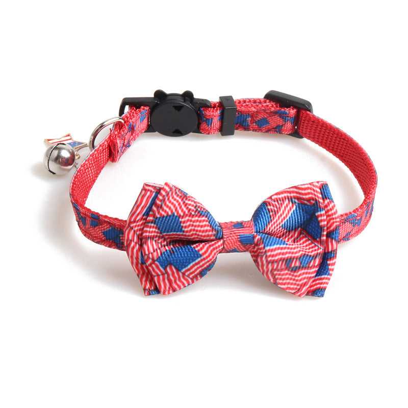 Red plaid and navy star bow tie cat collar with red strap and bell detail