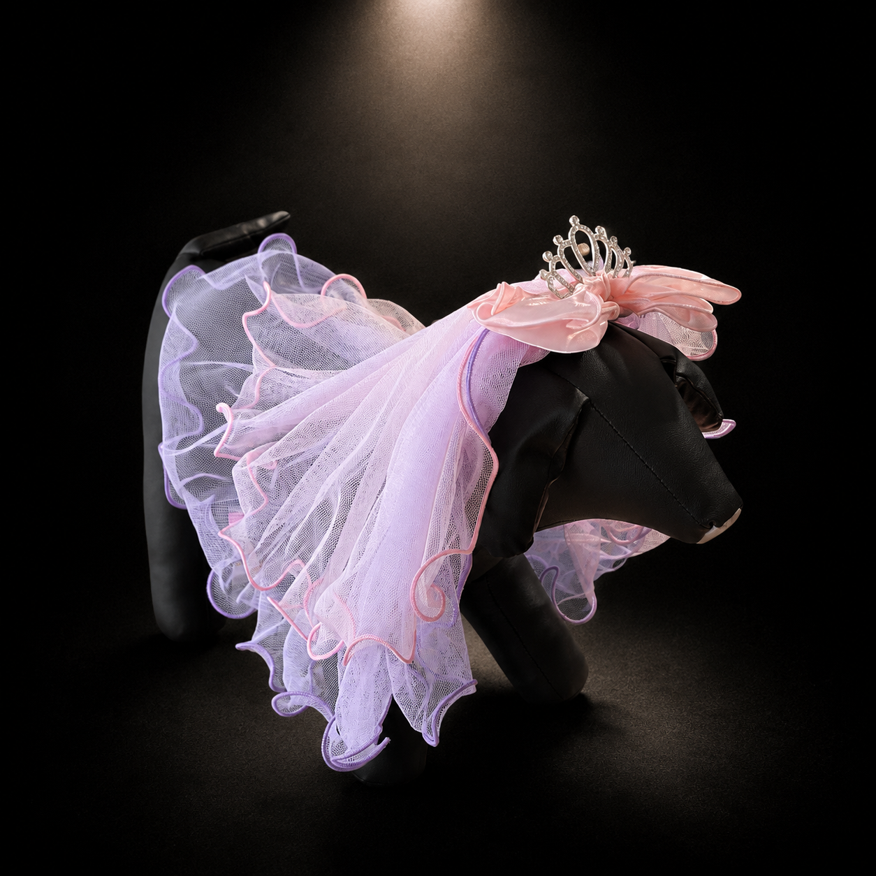Pink tulle tiara pet veil headpiece on dog display form with sheer ruffles and bow accent