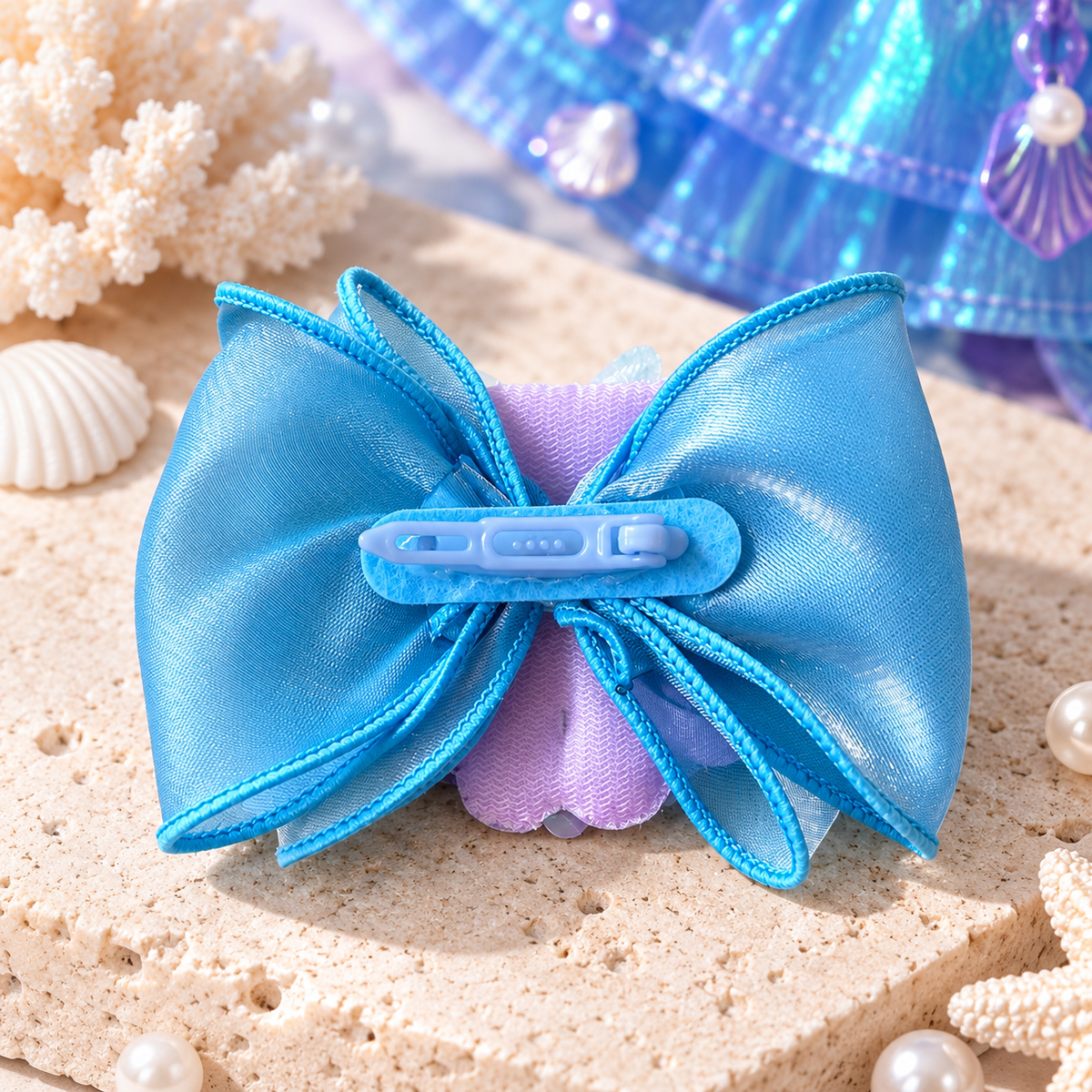 Back of matching mermaid pet hair bow showing blue barrette clip