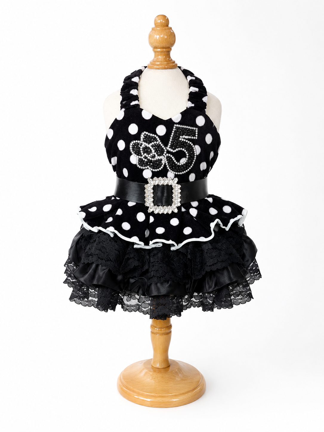Black and white polka dot pet dress with layered lace skirt and sparkling belt detail on mannequin