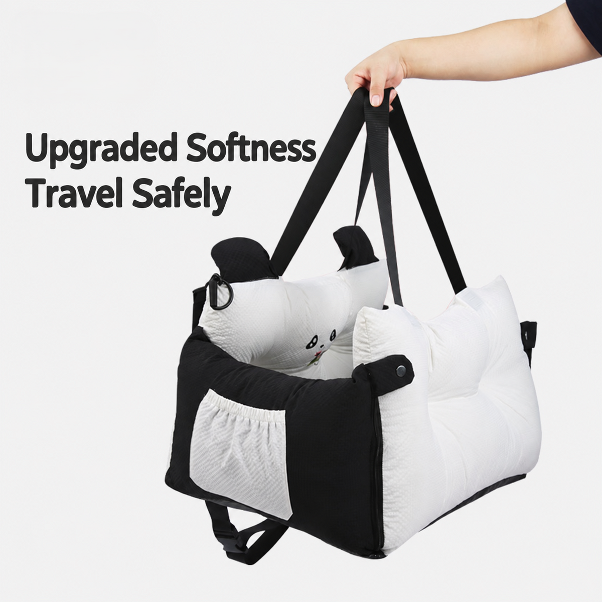 Black panda pet booster seat carried by its two shoulder straps