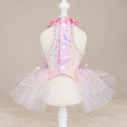 Back view of pink butterfly pet dress with white buttons and layered tulle