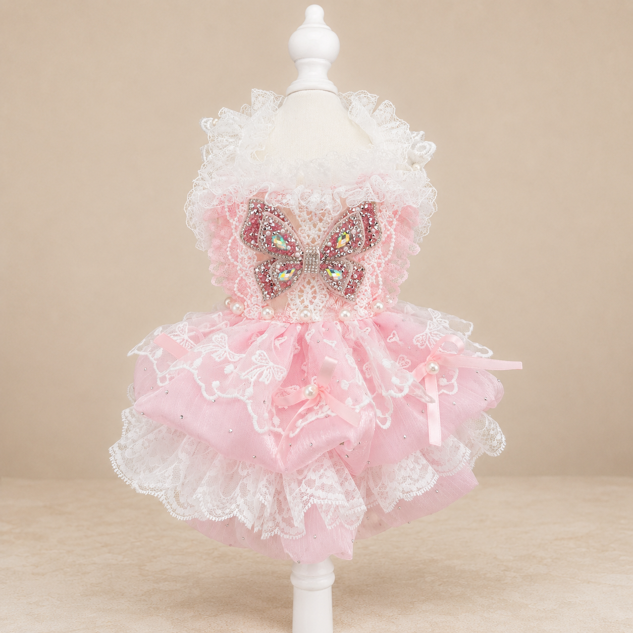 Pink lace tulle pet dress front view with butterfly bow and white ruffled neckline