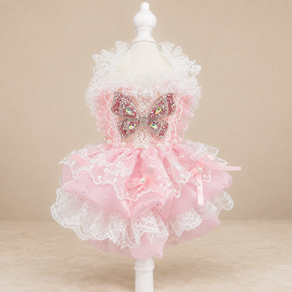 Pink lace tulle pet dress front view with butterfly bow and white ruffled neckline