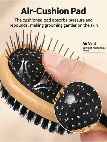 Cushioned metal pin pad and air vent close-up on pet brush