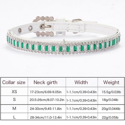 Designer white leather pet collar featuring emerald cut green crystals and sparkling rhinestones