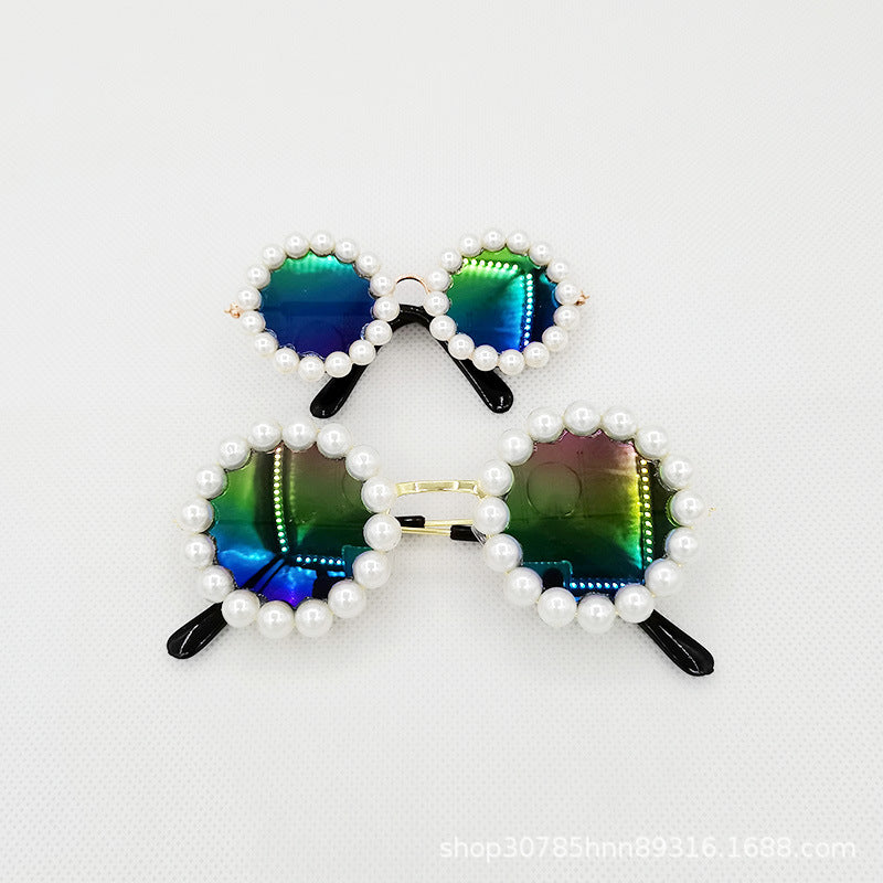 Small and large gradient lens pearl round pet sunglasses on white background