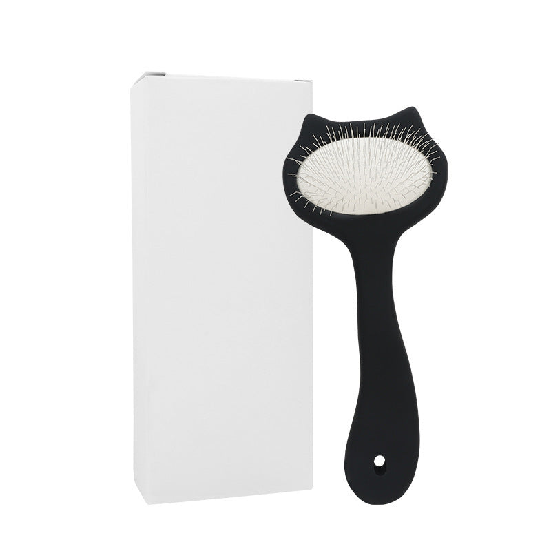 Black S size cat-ear pet slicker brush beside plain white box