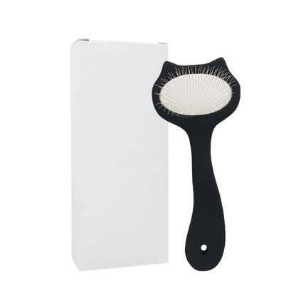 Black S size cat-ear pet slicker brush beside plain white box