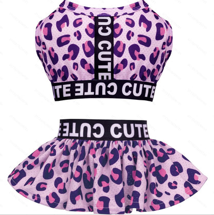 Flat lay of the pink leopard top and ruffle skirt dog dress set