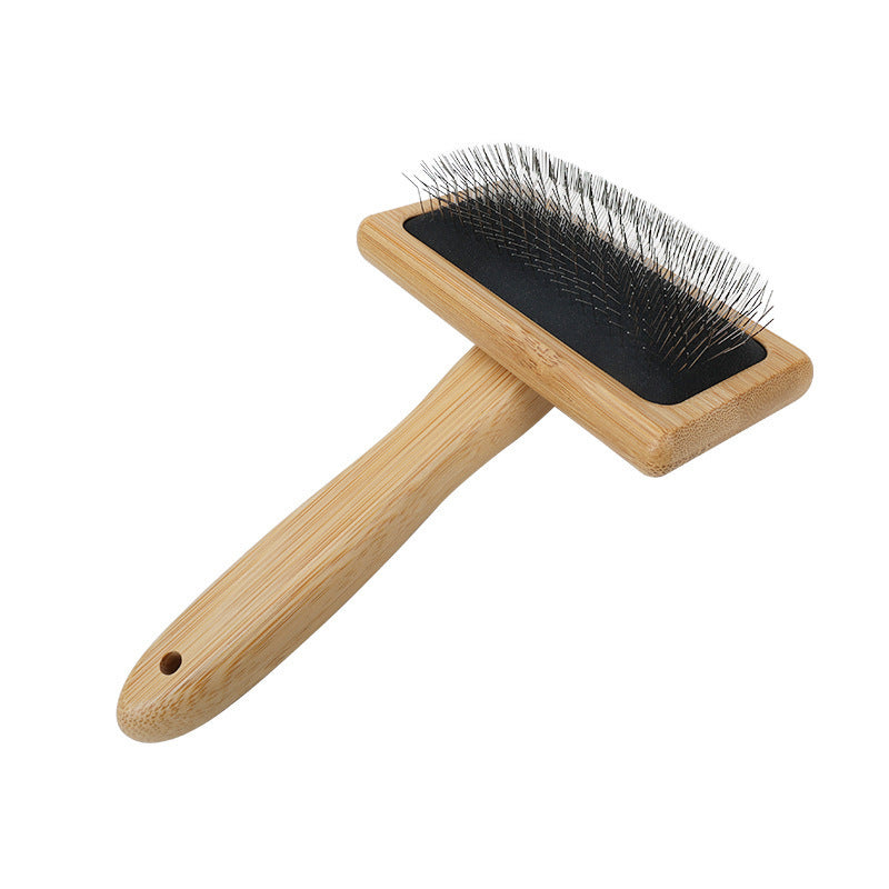Bamboo pet slicker brush angled view showing handle and wire pins