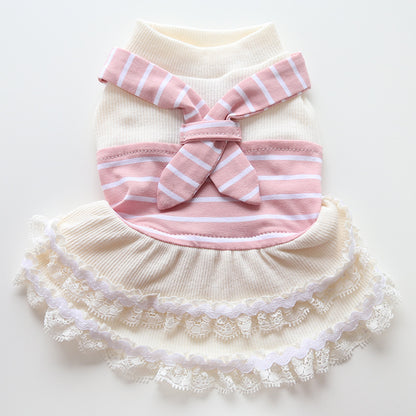 Pink and cream striped sailor pet dress laid flat with layered lace trim