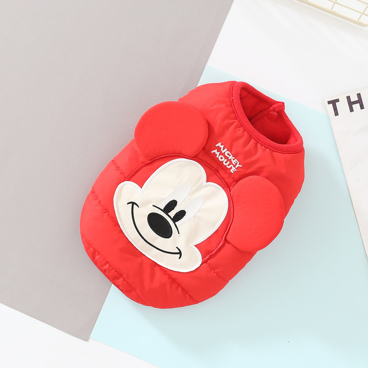 Red cartoon padded dog vest with raised face and ears