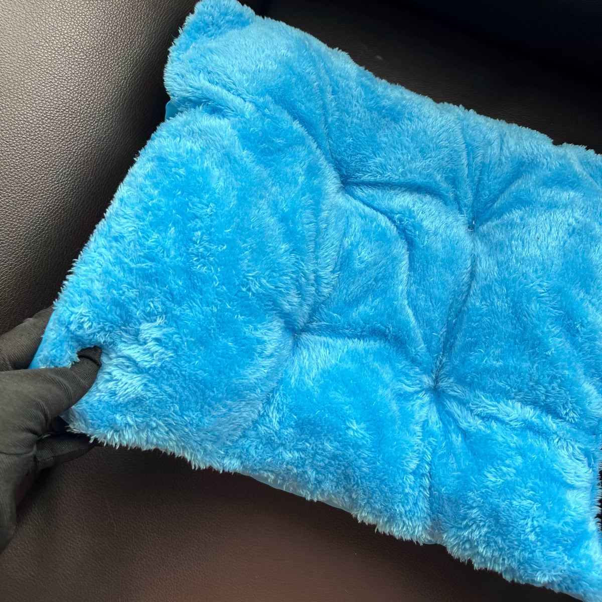 Close view of the bright blue short-plush cushion from the Stitch pet bed