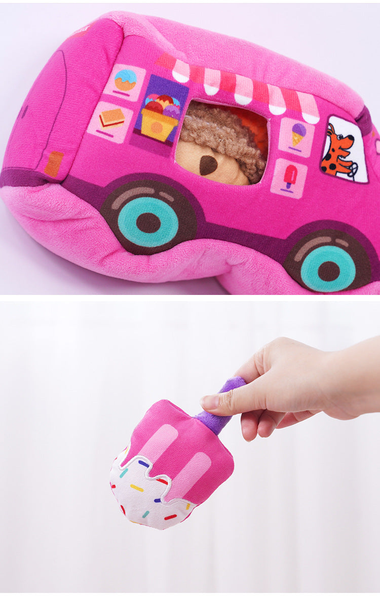 Dessert plush toys being placed inside pink ice cream truck dog toy