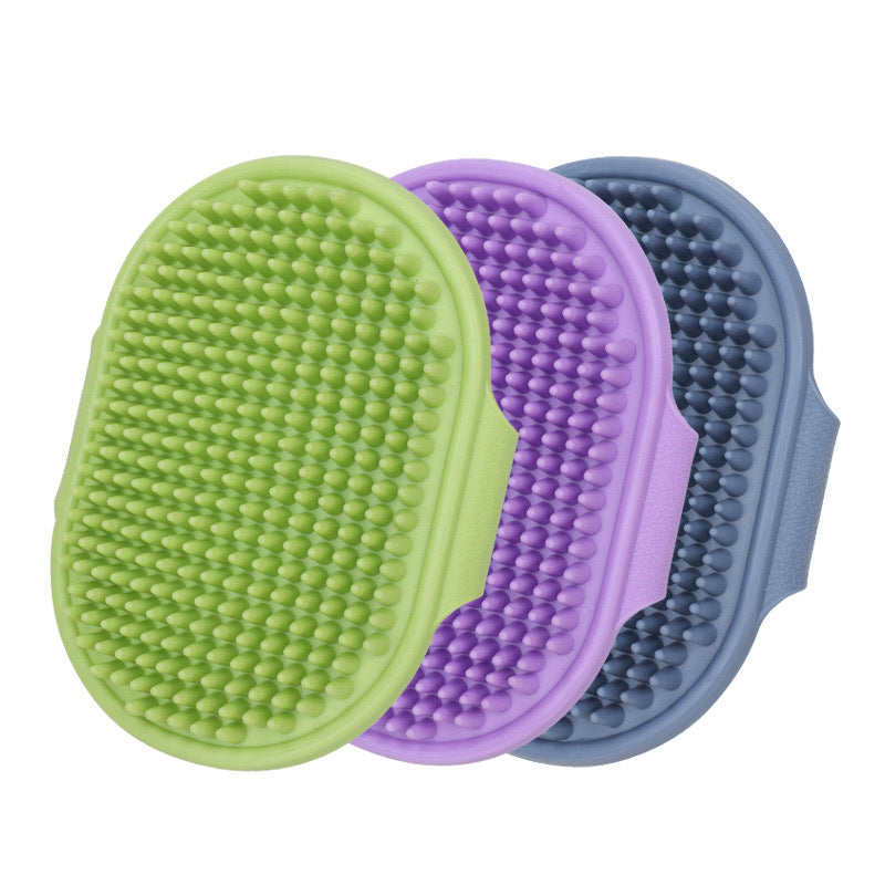 Green Purple and Blue pet bath brushes shown together
