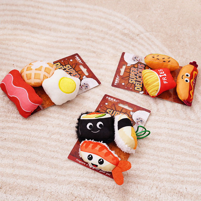Three packaged food-themed catnip plush cat toy sets arranged on a rug
