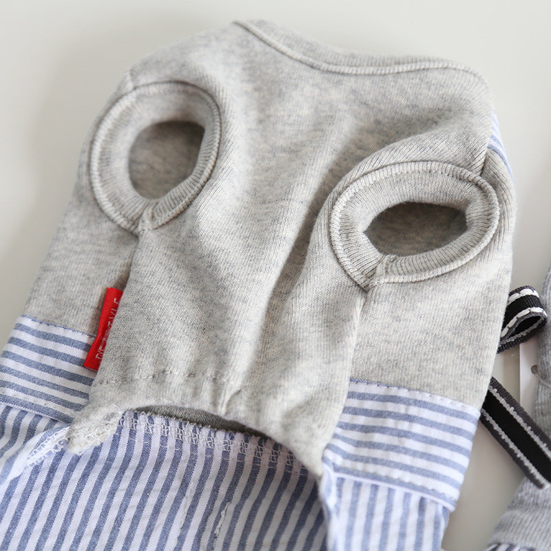 Underside of gray cotton pet shirt showing ribbed neck and arm openings