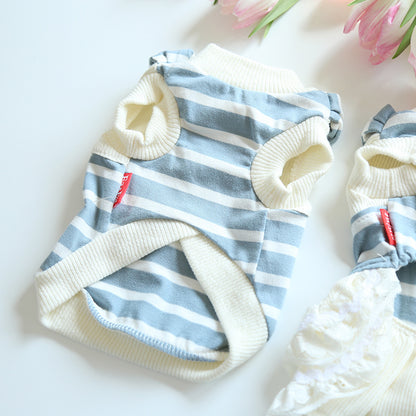 Underside of the blue striped sleeveless pet shirt with cream ribbed trim