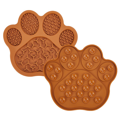 Brown paw silicone pet lick mat showing textured front and suction cup back