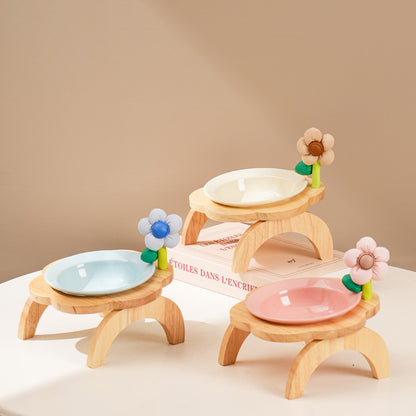 Elevated dog bowl with wooden stand and flower design for small dogs