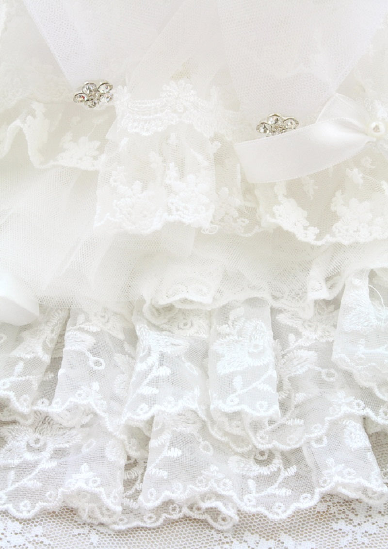 Handcrafted satin bodice and couture lace construction detail