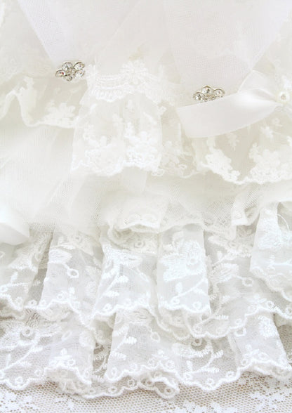 Handcrafted satin bodice and couture lace construction detail
